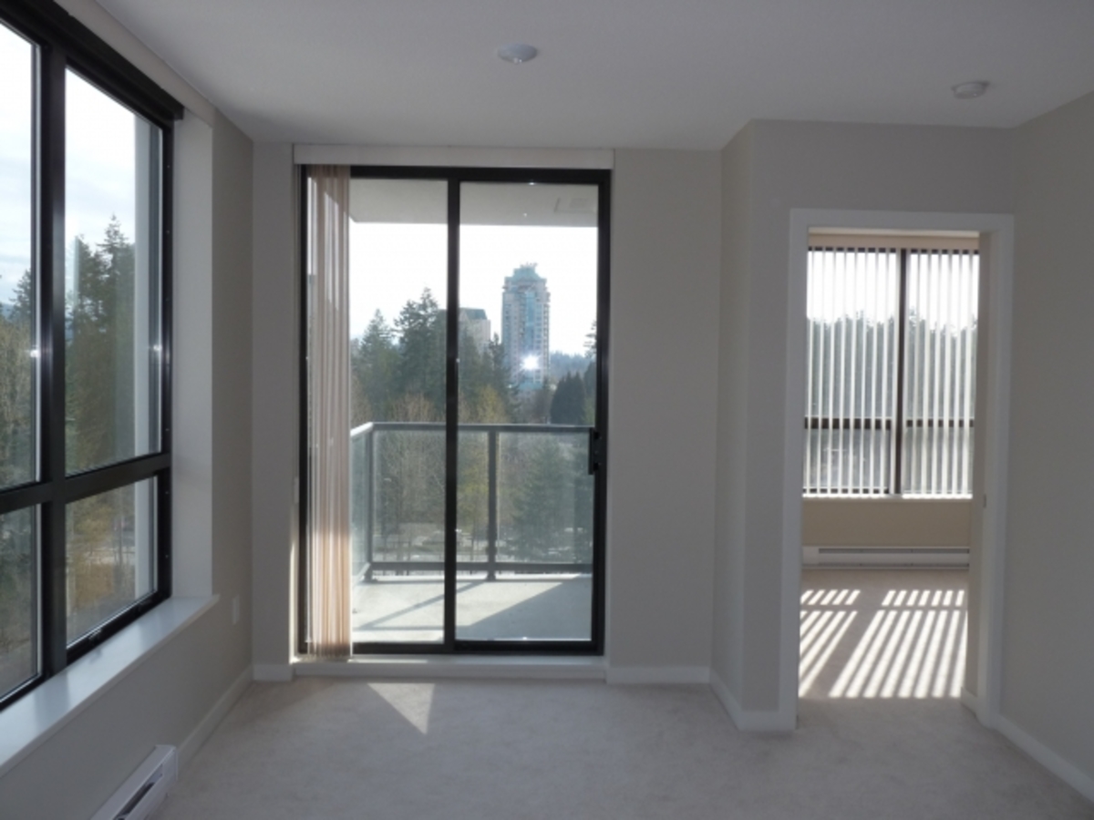 Livingroom Area at 1002 - 2979 Glen Dr, Coquitlam Center, Coquitlam